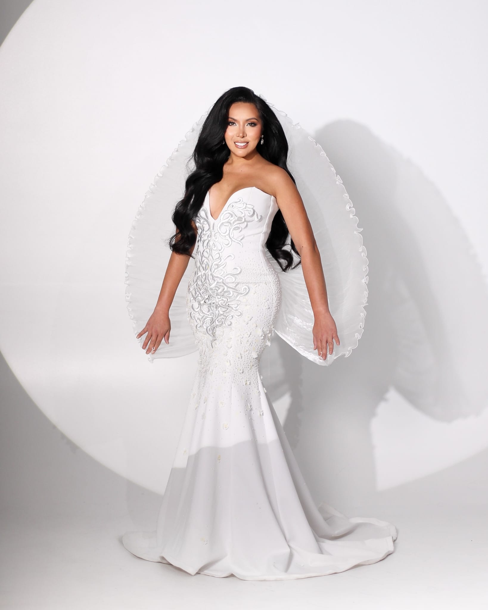 kim white gown full smile